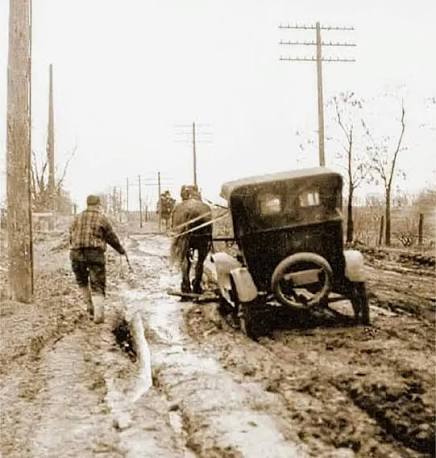 What is the history of the unpaved roads in the 1920s?
