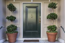 Black front door with modern farmhouse details. 11 Black Front Door Ideas To Make A Grand Entrance Homenish