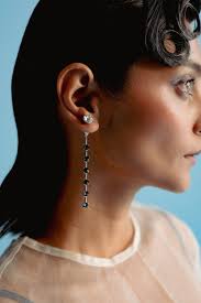 White Finish Swarovski Dangler Earrings by ESME at Pernia's Pop Up Shop 2024