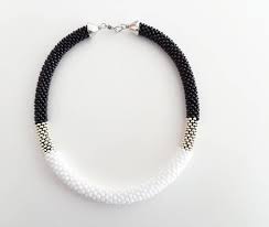 Black And White Jewelry A Black White Beaded Rope Necklace Made Of Beautiful Glass Beads This Crocheted Rope Necklace Can Be A Ve Beaded Rope Rope Jewelry Black And White Necklaces