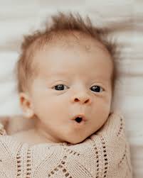 Sweet little Oakley, with all his tiny perfect newborn features, already  knows how loved he is 🥰 A reminder of just how precious these early days  are ♥️