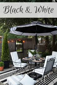 Designing An Outdoor Dining Area In Black And White Can Create An Elegant Look Outdoor Patio Decor Patio Furniture Makeover Patio Design