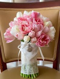 For the month of march, we are celebrating the tulip. Tulips And Peonies Wedding Bouquet Peoniesbouquet Tulip Wedding Wedding Flowers Tulips Rose Wedding Bouquet