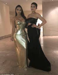 Kim kardashian dazzled on the red carpet at the met gala 2018 as she got into the swing of the heavenly bodies theme last night. Met Gala 2018 Kim Kardashian Makes Gold Great Again In Busty Gown Express Digest