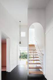 Photo 3 Of 11 In Discover 10 Impressive Spaces With Arched Windows Sydney House House Floating Staircase