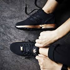 Black And Gold Adidas Zx Flux Womens Amanda On Instagram For Everybody The Adidas Zx Flux Core Black Light Cooper Sold At Extrabutter Is S Black Adidas Shoes Adidas Zx Flux Black Zx Flux Black