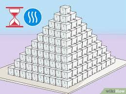The top edges of the cards should meet, and the bottom edges should be evenly spaced apart from a central axis. 3 Ways To Build A Pyramid For School Wikihow