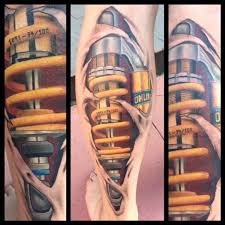 Ohlins Shock Tattoo Biomechanical Tattoos Tattoo Kunstler Und Biomechanic Tattoo