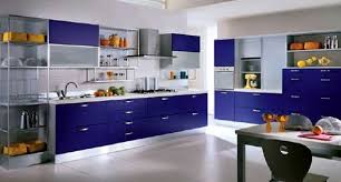 Dark countertops and colored grout contrast perfectly with stark white. Small Kitchen Renovation Ideas