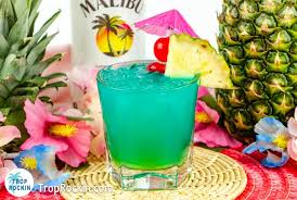 Coconut malibu rum, pineapple juice, ginger ale, and grenadine syrup will make you think you're on a tropical island with this cocktail recipe. Electric Smurf Drink Coconut Rum Yum Trop Rockin