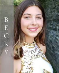 Meet the squad! Sophomore Becky Bloemer! Hi, my name is Becky Bloemer. I am  a sophomore, and I have been twirling for 2 years. Last year I was a  varsity majorette and