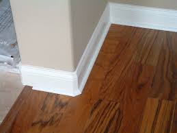 Installing Quarter Round On Round Corners Floor Trim How To Install Baseboards Floor Rugs Diy