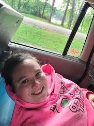 Using a pool float as a makeshift bed in a car for short rests