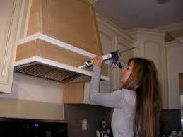 We shared the steps we took to build our diy wood range hood cover. Kcfauxdesign Com Diy Decorative Hood Range Vent Wooden Range Hood Kitchen Vent Kitchen Range Hood