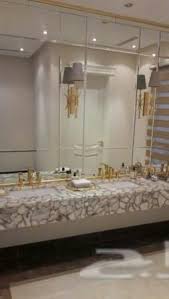 زجاج مرايات ديكور براويز طاولات لدينا كافه أعمال الزجاج والألمونيوم والمرايا بكافه أنواعهم تخصصنا المرايا Bathroom Mirror Lighted Bathroom Mirror Home Decor