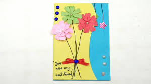 Fold the sheet into two with the help of scissor make little hearts with sticky notes randomly paste these hearts with the help of glue on your card How To Make Handmade Birthday Cards For Friends Greeting Card Making Ideas Youtube