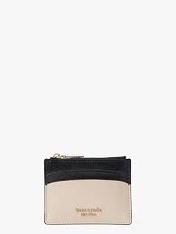 On the front the id window has an easy access thumb slide to access your id quickly and return it smoothly and without struggle. Women S Designer Cardholders Card Cases Kate Spade New York
