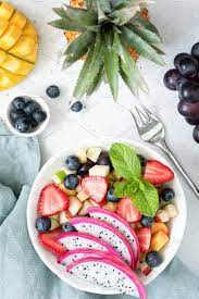 Fruit Salad With Tropical Fruits Featuring Fruit Salad And Bowl Food Photography Fruit Tropical Food Food