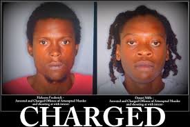 TWO CHARGED IN SHOOTING INCIDENT IN SANDY POINT