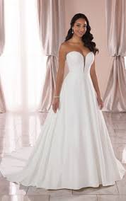 Satin or silky satin fabric is a good choice for simple wedding gowns. Strapless Simple Satin Ballgown Stella York Wedding Dresses