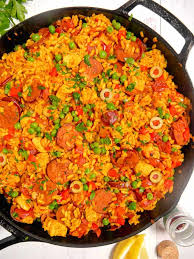 Chicken And Chorizo Paella Girl With The Iron Cast Paella Recipe Easy Paella Recipe Chicken Paella Recipe Seafood