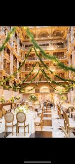 Maybe you would like to learn more about one of these? Pin By East Made Co On K M Peabody Library In 2021 Affordable Wedding Photography Tall Flower Arrangements Library Wedding