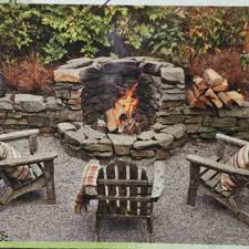 Fire Pit Built Into Rock Wall Fire Pit Backyard Backyard Fire Fire Pit Seating