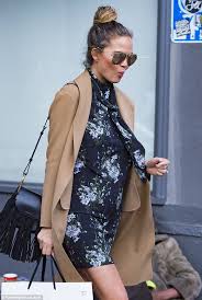 Image result for Chrissy Teigen Does the Knotted Shirt Like a Grown-Up