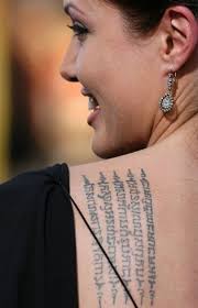 Before receiving the honorary dame by the queen in 2014 for her contributions to preventing sexual violence in war zones, angelina jolie was quite the rebellious gal. Gallery Angelina Jolie Tattoo Back