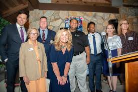 Mayors Zeb Smathers, Barbara Volk, and Tim Radford, with BBBSWNC CEO Lelia  Duncan, VP of Philanthropy Dorian Palmer, Mayor Preston Blakely, BBBSWNC  Board Chair Debbie Charlton, and Mayor Esther Manheimer