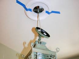 A recessed light bulb lies flush with the ceiling or other surface, making it nearly impossible to grab and unscrew it by hand. Replace Recessed Light With A Pendant Fixture Hgtv