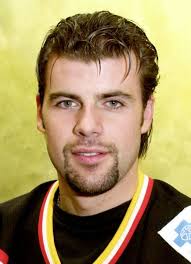 Player photos for the 1993-94 Fort McMurray Oil Barons at hockeydb.com