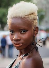 Image from Global Couture's Facebook page. Fluffy blonde curls.