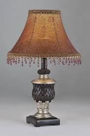 Its antique gold metal finish and white cotton drum shade accentuate the gentle curves of its base. Antique And Classic Table Lamps Set Timeless Accents Wholesale Floral Printed Cloth Art Cover With Glass Pendant Antique Table Lamps Lamp Classic Table Lamp