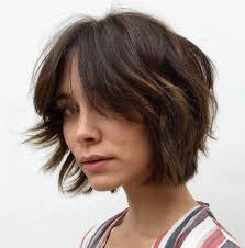 It will look mesmerizing with this bob haircut with bangs flipped on one side. Short Shaggy Bob With Bangs Bobhaircutswithbangs Bobwithbangs Shaggy Bob Hairstyles Wavy Bob Hairstyles Thick Hair Styles