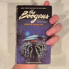 An abandoned mine with a deadly secret is reopened in… Charles E. Sellier,  Jr. & Robert Weverka's “The Boogens” (1981) -1981 MMPB Movie Novelization  by Bantam -Based on James L. Conway's “The