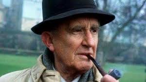J.R.R. Tolkien, born January 3. 1892, smoking a favorite Dunhill.