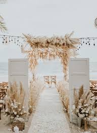 Stand out on the beach with this trendy backdrop! 25 Intimate Boho Themed Summer Beach Wedding Ideas Elegantweddinginvites Com Blog
