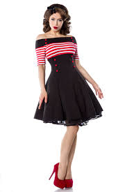 It dates back to the early 1950s in the united states, especially the south.as a genre it blends the sound of western musical styles such as country with that of rhythm and blues, leading to what is considered classic rock and roll. Sailor Rockabilly Kleid Mit Streifen Und Knopfen Schwarz Rot