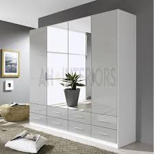 Rustic, modern country, farmhouse, traditional Rauch Stuttgart 4 Door Hinged Combi Wardrobe And Bedroom Furniture