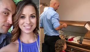 Heartbroken dad who shared photo of wife and child in coffin speaks out