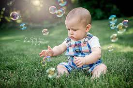 Bubbles Green Grass And A Little Backyard Flying Make Great Summer Family Photos Baby Photoshoot Boy 6 Month Baby Picture Ideas Baby Boy Photography
