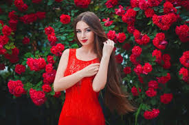 Girl Wearing A Red Dress With Red Flowers Background Stock Photo Hair Transplant Natural Hair Styles Best Hair Transplant