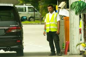 An interview with a security guard. Is It Legal For Security Guards To Keep Your Mykad