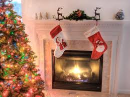 Christmas decorating holiday decorating christmas decorating fireplaces holidays and occasions mantels. Deck The Fireplace With Holiday Decor Hgtv
