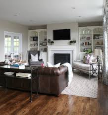 Family room decorating ideas with leather furniture. Decorating With Leather The New Sofa Family Friendly Living Room Home Living Room Living Room With Fireplace