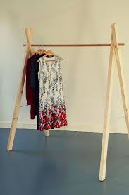 A simple pipe clothing rack can cost more than $100 from a trendy retailer, or it can cost a fraction of that if you do it yourself at home. This Item Is Unavailable Etsy Wooden Clothes Rack Clothes Rack Design Clothing Rack