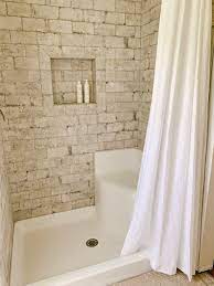Continuous floor with no lip or step into the shower makes the transition seamless. Why We Opted For A Shower Curtain Instead Of A Glass Door Sarah Jane Christy