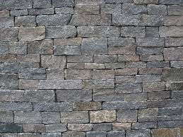 Mosaic pattern stone veneer consists of irregular pieces of natural stone for siding, facing, and cladding. Vineyard Granite Ledge Stoneyard Stone Veneer Stone Masonry Stone Exterior Houses