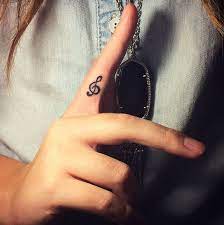 See more ideas about finger tattoos, small finger tattoos, tattoos. Treble Clef Index Finger Tattoo Small Music Tattoos Tattoos For Women Music Tattoo Designs